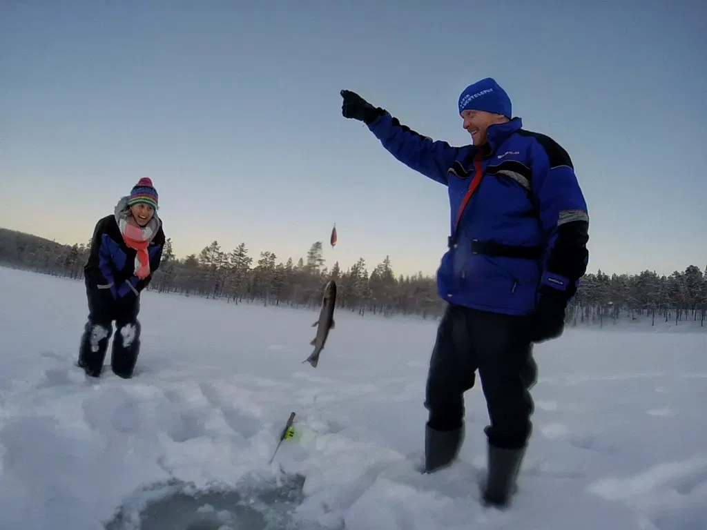 Ice fishing safari to the lake Taimenjärvi by snowmobile - Saariselkä