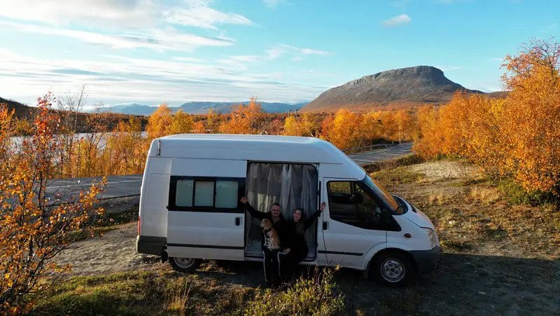 Traveling Through Autumn Foliage In Lapland
