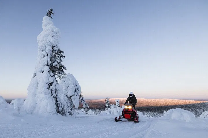 Levi Fell Tour with Snowmobile