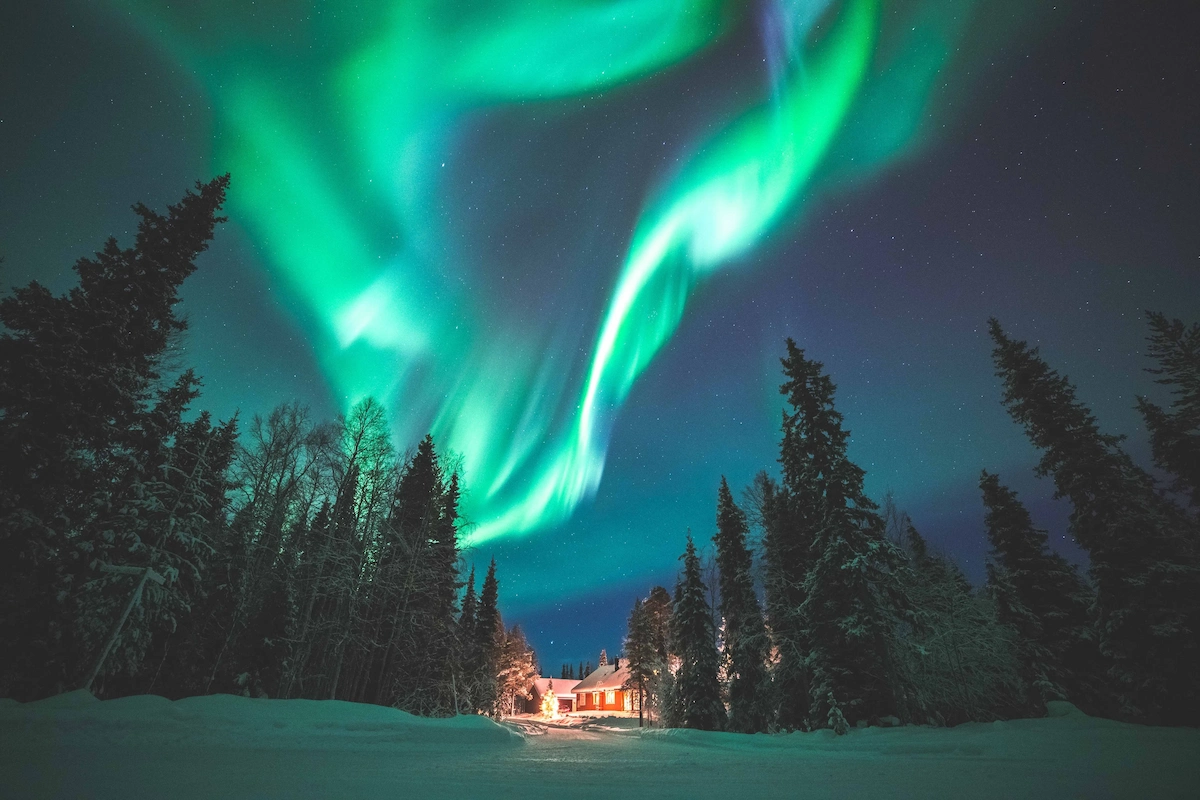 Searching for Northern Lights by Snowmobile in Ylläs