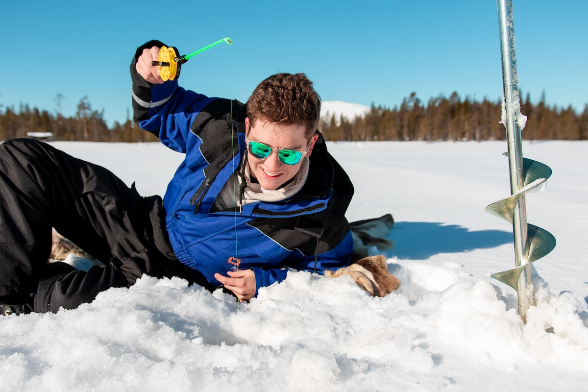Ice fishing experience by car in Levi