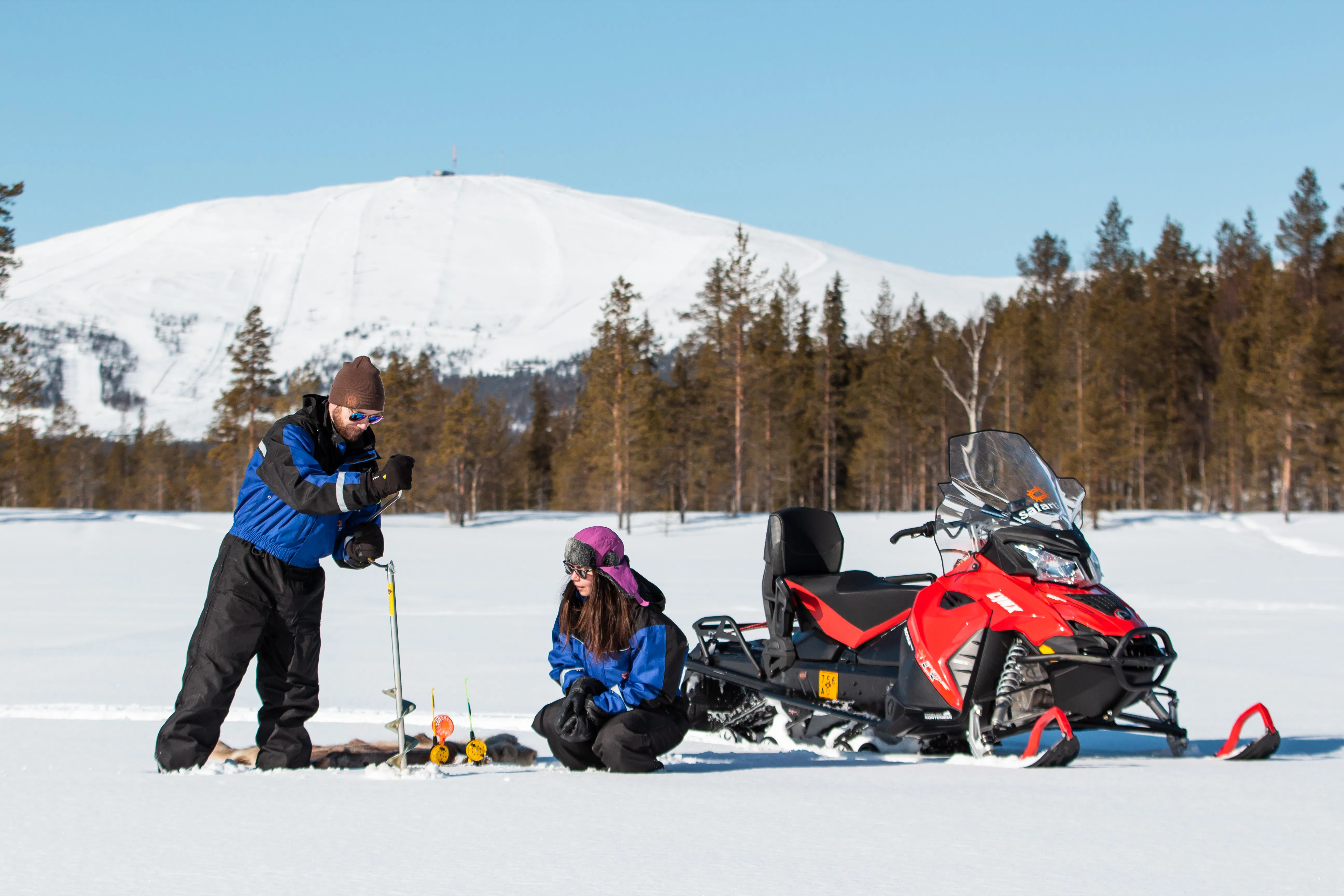 Snowmobile safari with Ice Fishing and outdoor lunch in Levi