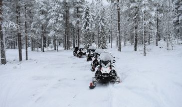Snowmobile ride in Lapland- Rovaniemi in winter outdoor by Simon
