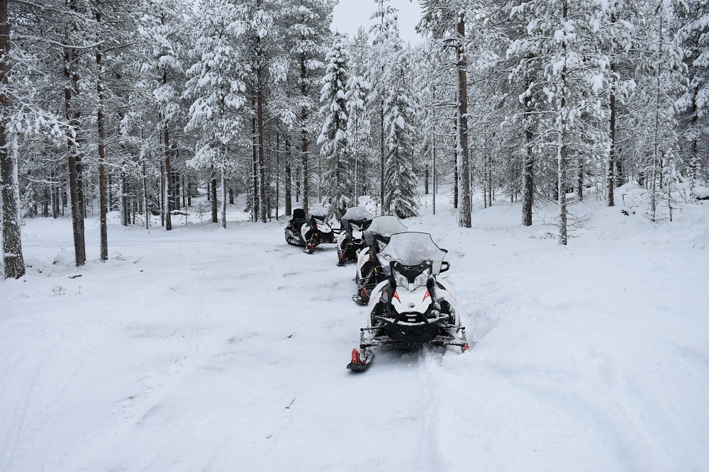 Snowmobile ride in Lapland- Rovaniemi in winter outdoor by Simon