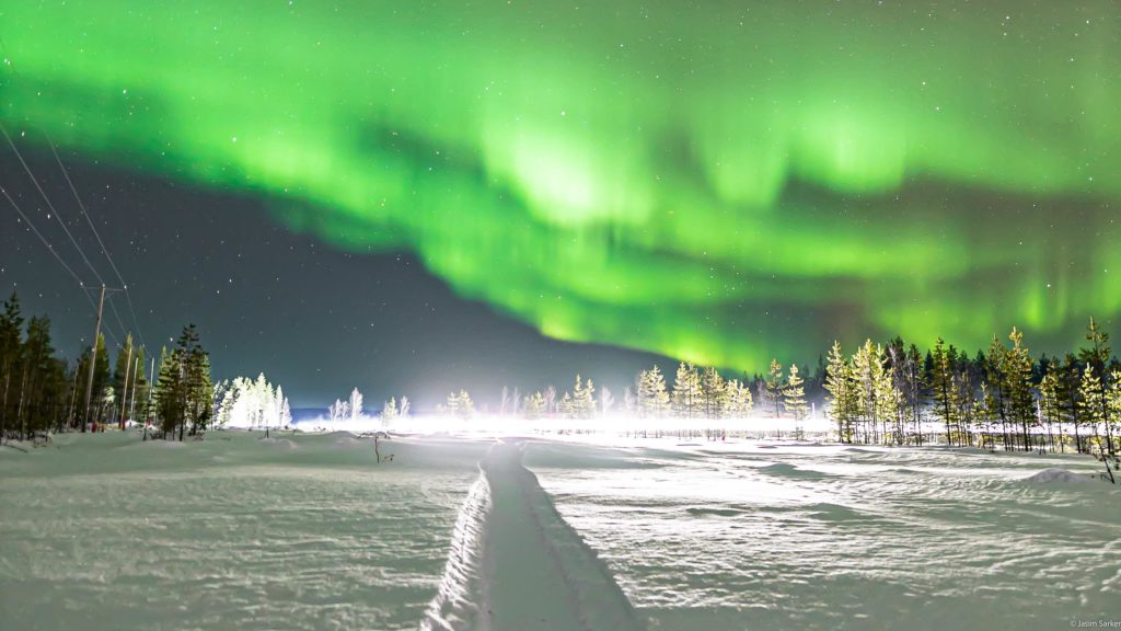 Finland Lapland aurora Rovaniemi Winter Snowy trails by Jasim Sarker