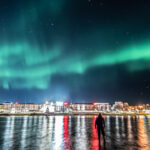 Northern lights in Rovaniemi city centre Lapland Kemijoki Finland By Jasim Sarker