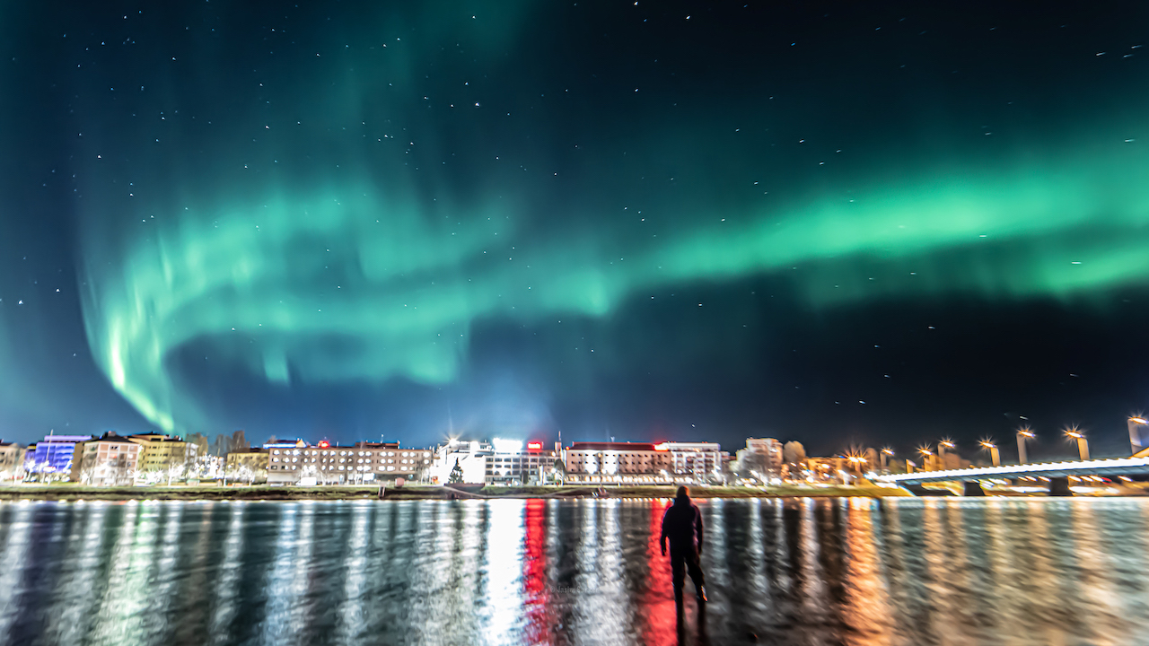 Northern lights in Rovaniemi city centre Lapland Kemijoki Finland By Jasim Sarker
